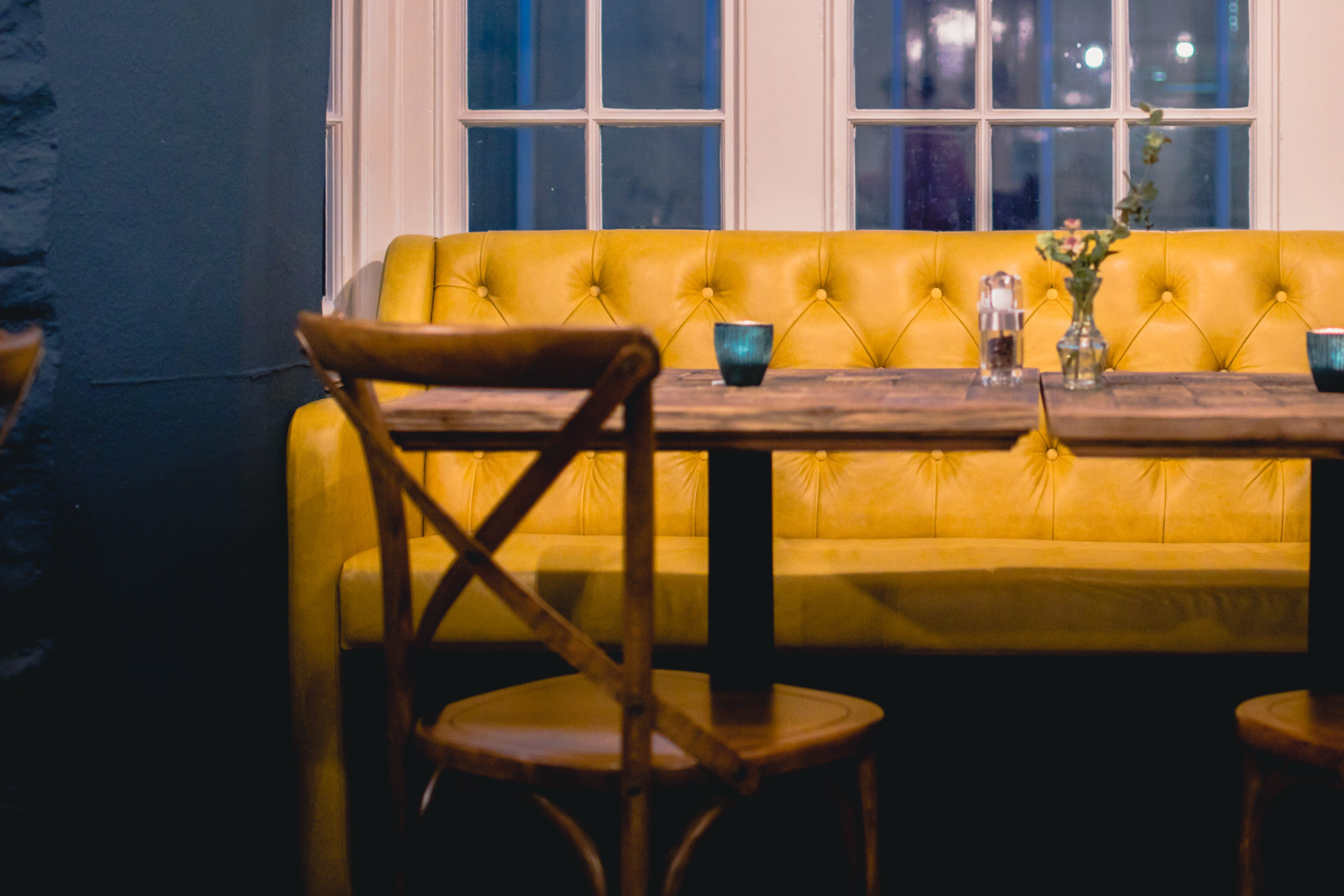 Bench Seating upholstered by Oswall and Rose in Yarwood Leather Mustang Mustard. Photography by Salt Media