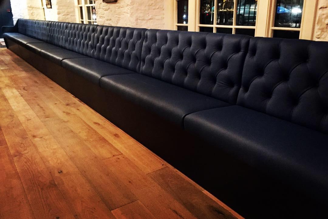 Bench Seating upholstered by Oswall and Rose in Yarwood Leather Style Marine. Photography by Salt Media