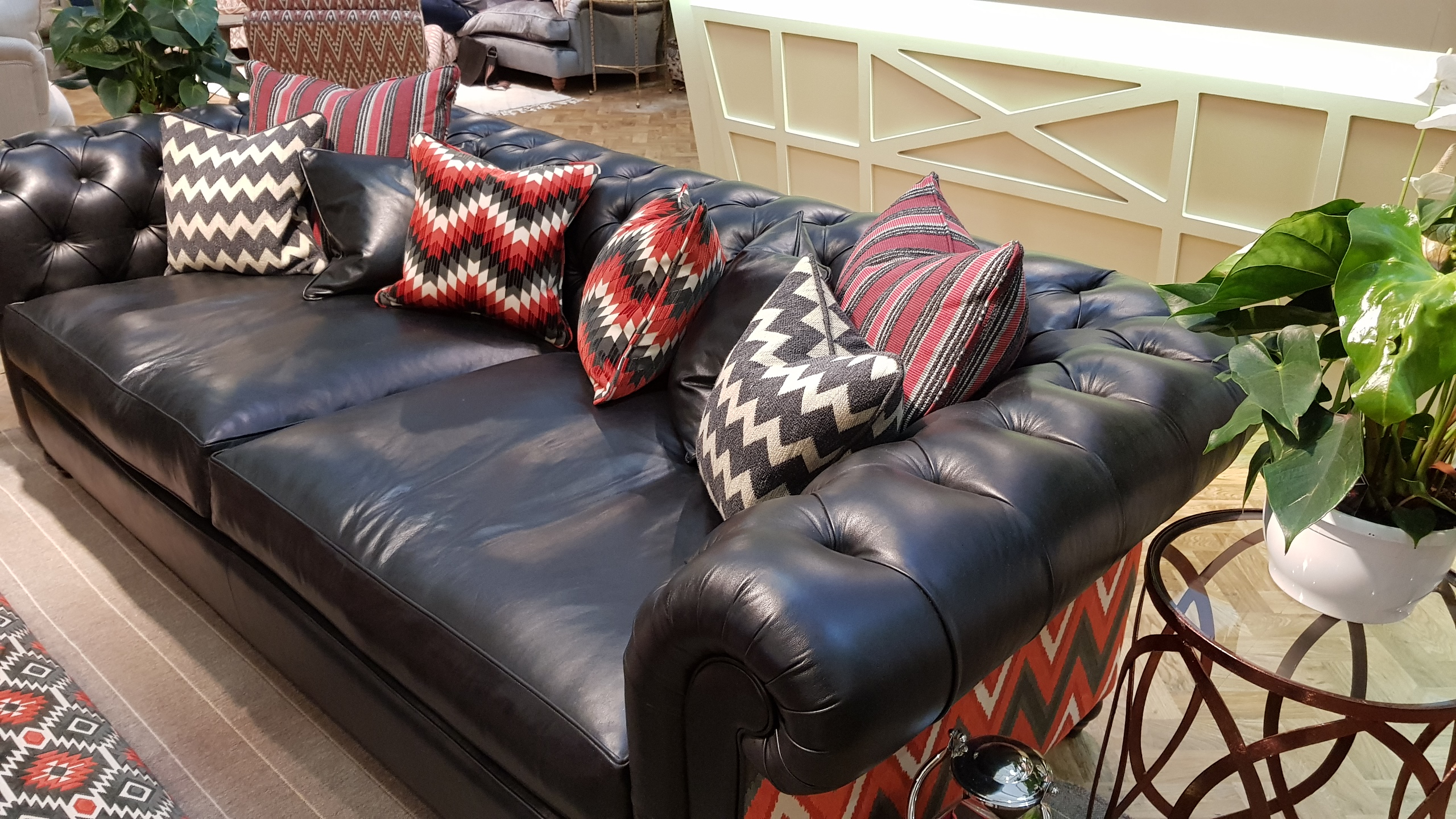 Duresta sofa upholstered in Yarwood Leather Mustang Black