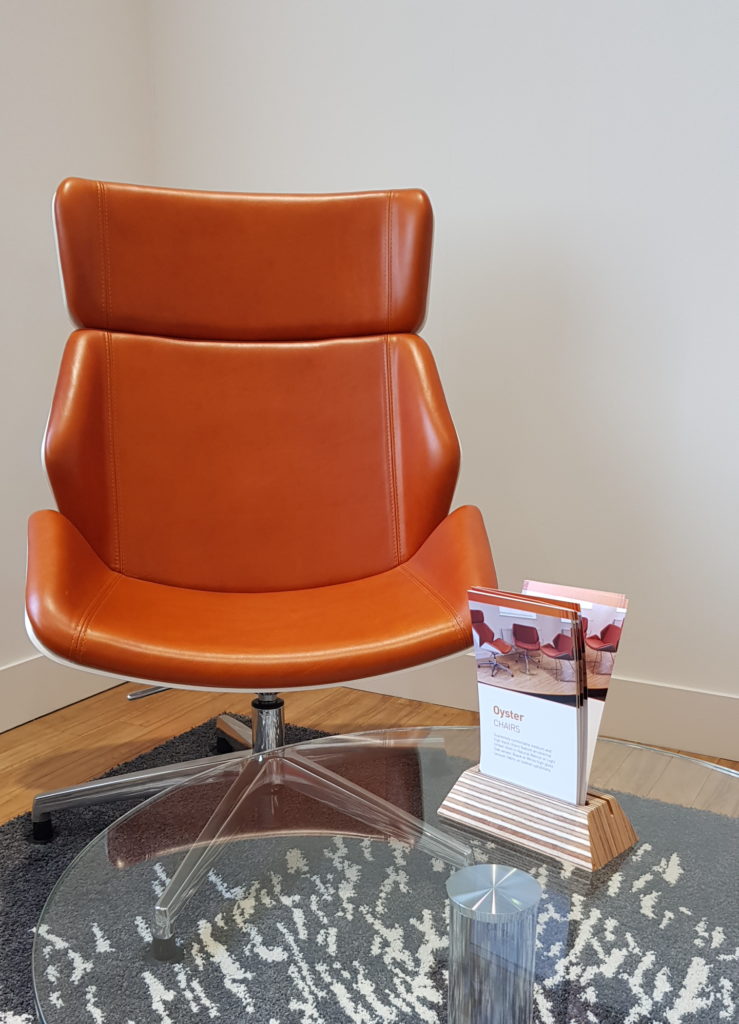 Oyster chair workplace seating from Sven upholstered in Yarwood Leather's Mustang Pumpkin